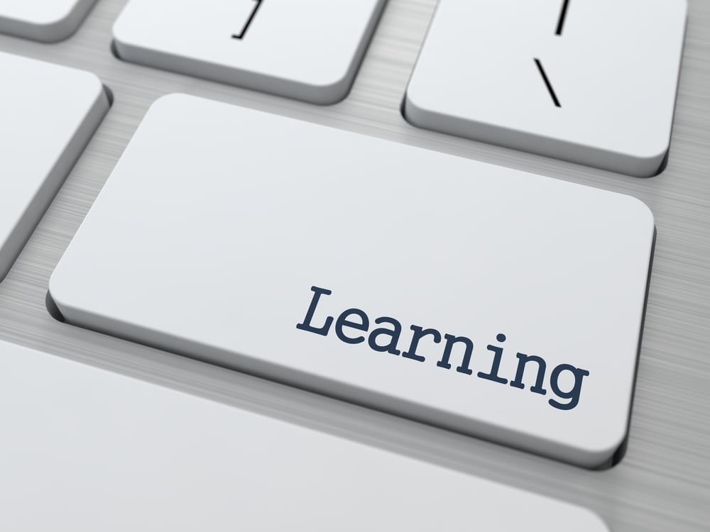 Learning - Educational Concept. Button on Modern Computer Keyboard. 3D Render. Learning - Educational Concept. Button on Modern Computer Keyboard. 3D Render.