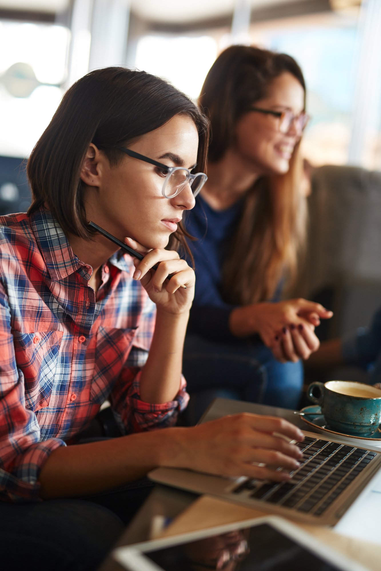 concentrated-women-working-together-in-a-cafe-2026-03-24-04-03-36-utc concentrated-women-working-together-in-a-cafe-2026-03-24-04-03-36-utc
